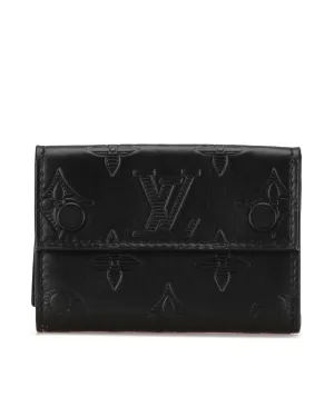 Monogram Leather Compact Wallet with Snap Closures and Interior Slip Pockets